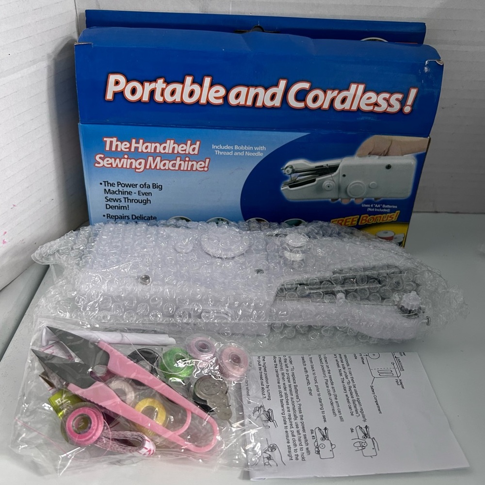 Handy Stitch - The handheld sewing machine